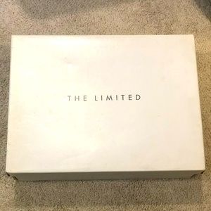 The limited high heel shoes. Excellent knock off with a MK snake skin purse.